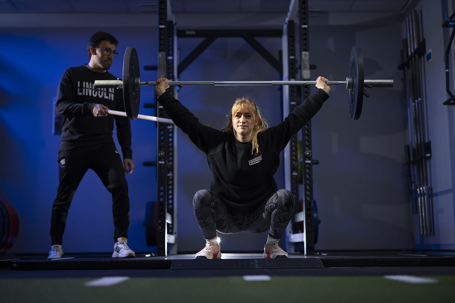 weightlifting coaching during squat